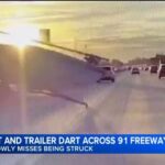 U-Haul TRAGEDY: Unsecured Load Sparks Panic Driver narrowly avoids disaster as loose boat darts across