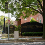 Unknown Drones Over High-Security Military Base Entrance sign of Fort Lesley J. McNair, a military installation in Washington D.C.