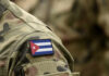 Cuba on EDGE: Military Readiness Soars Close-up of a soldier's uniform featuring the Cuban flag patch