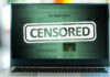 Online Safety Act Controversy—Freedom at Risk? A laptop screen displaying a 'CENSORED' label over blurred content