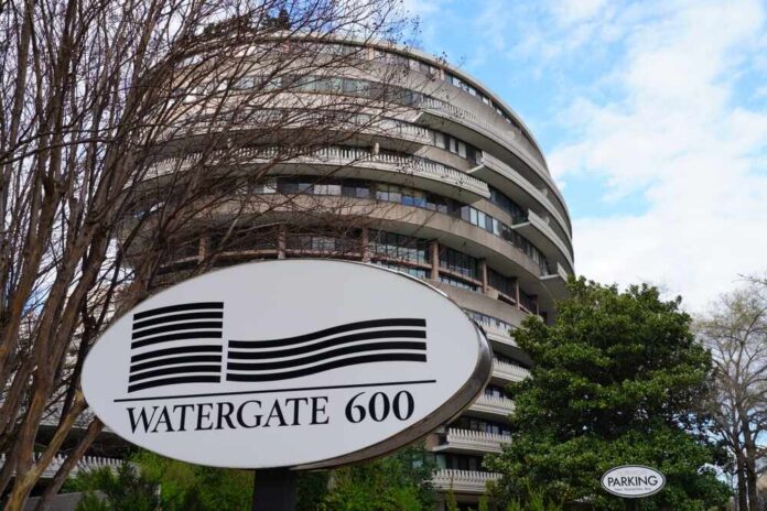 Watergate 600 building with a sign in front