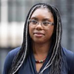 North Sea Oil: Taxpayer Relief or Financial Trap? Close-up portrait of a woman with braided hair wearing glasses