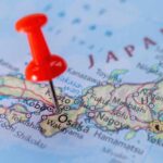 Massive Pipe Explosion Blocks Osaka Highways A close-up of a map of Japan with a red pushpin marking Osaka