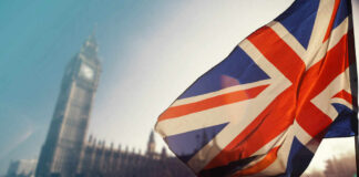 Union Jack flag in front of Big Ben in London