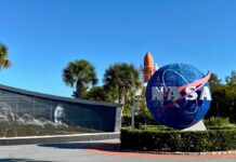 NASA logo and memorial wall featuring John F. Kennedy