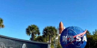 NASA logo and memorial wall featuring John F. Kennedy