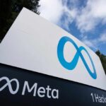 Sign displaying the Meta logo and address at 1 Hacker Way