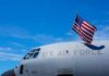 Close-up of a military aircraft with an American flag