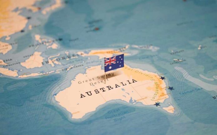 Map highlighting Australia with a flag pin