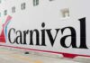 Close-up of the Carnival cruise ship logo on its hull