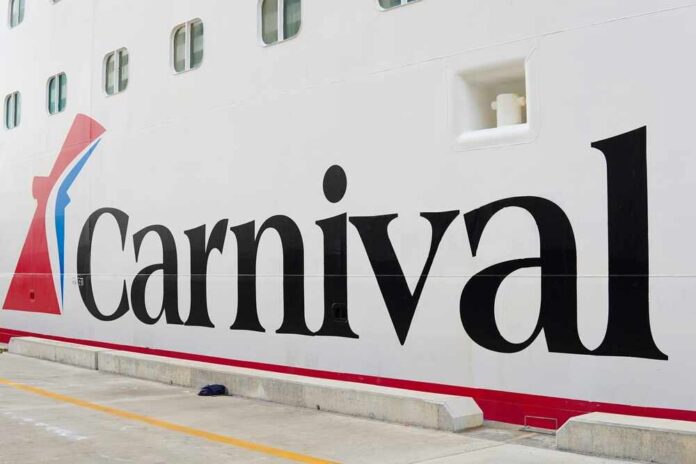 Close-up of the Carnival cruise ship logo on its hull