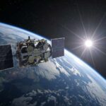 Satellite Blackout: What’s Trump Hiding in Iran? Satellite orbiting Earth with solar panels and the sun in the background