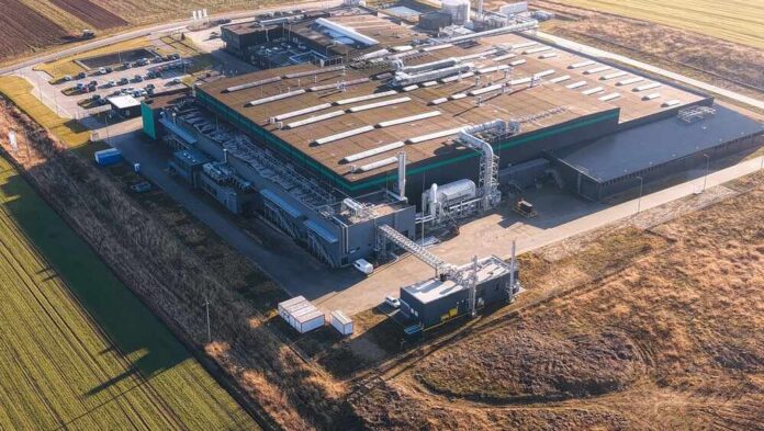Aerial view of a large industrial facility with various structures and equipment