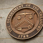Facade of the Department of the Treasury with columns and engraved text