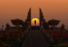 Faith Betrayed: Healer’s DARK Side Exposed! Silhouette between ancient temple gates at sunset.