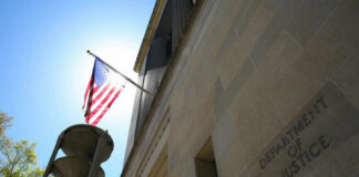 Department of Justice building with American flag