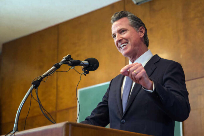 Man speaking at podium with microphone