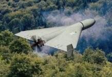 Drone Threat: Is U.S. Homeland at Risk? A kamikaze drone flying over a dense forest