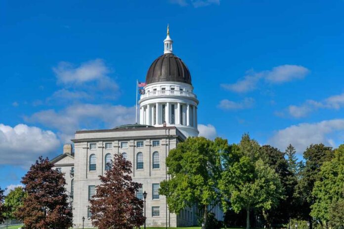State capitol building with a dome under a clear blue sky