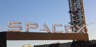 Sign displaying the SpaceX logo at a launch site