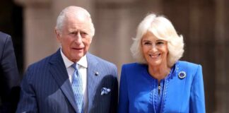 A royal couple smiling during a public appearance