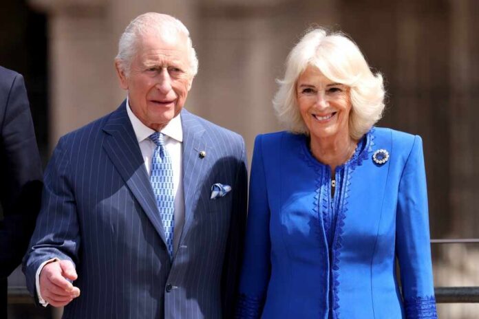 A royal couple smiling during a public appearance