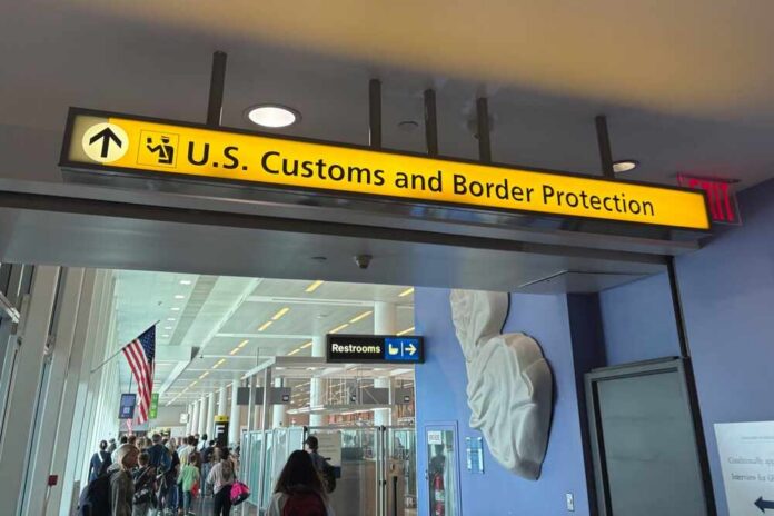 August,2,,2025,-,Queens,,New,York:,People,Walk,Through Sign for U.S. Customs and Border Protection at an airport