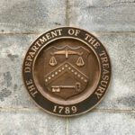Treasury’s Trump Twist: Law or Lure? Department of the Treasury bronze seal on stone wall