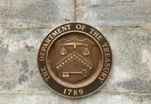 Department of the Treasury bronze seal on stone wall