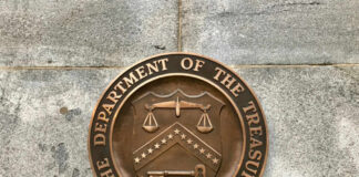 Department of the Treasury bronze seal on stone wall
