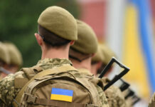 Ukraine’s ‘Witches’ Rewrite The Kill Chain Soldiers in uniform with Ukrainian flag patches.