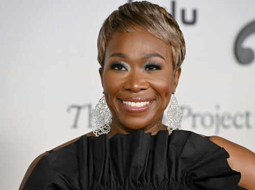joy-reid2254595685jpg Person smiling wearing large earrings and a black top
