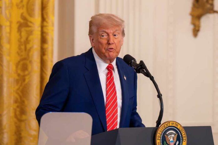 Washington,dc,,United,States,,May,8,2025,,President,Donald,Trump,Speaks A man in a suit speaking at a podium in a formal setting