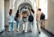 Federal Review Targets California School Districts Five students walking in a school hallway together