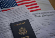 Denaturalization Dragnet Expands—Who’s Next? Passport and documents on table with American flag