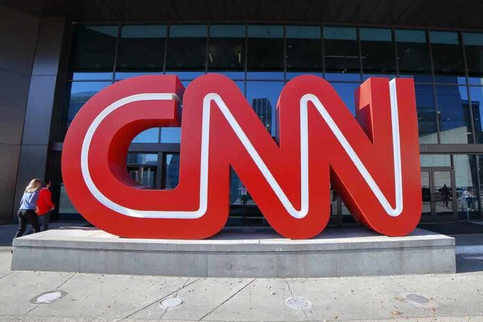 CNN red logo sculpture outside a building entrance