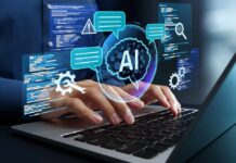 Hands typing on a laptop with AI graphics overlay