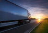 Fatal Turnpike Crash Exposes Licensing Gaps A truck driving on a highway during sunset