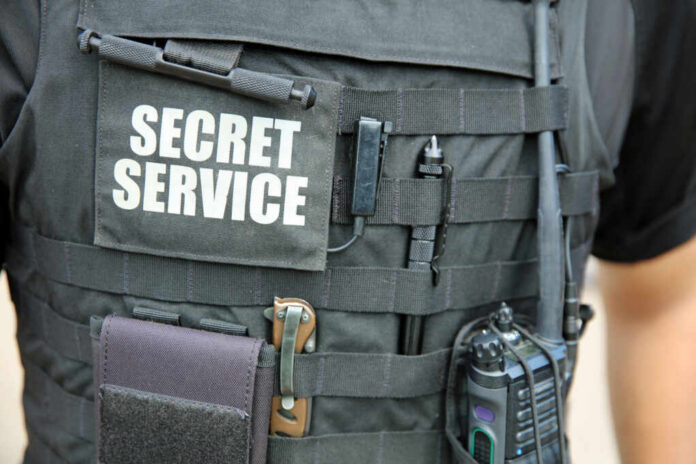 Tactical vest with equipment and a visible service patch
