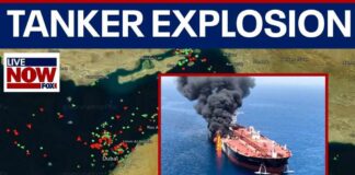 Tanker reports explosion in Strait of Hormuz as Iran denies deal with US
