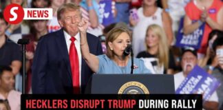 Hecklers disrupt Trump at South Carolina rally to support Darline Graham