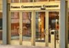 Behind America’s Screens, Ownership Keeps Concentrating Federal Communications Commission building entrance with glass doors