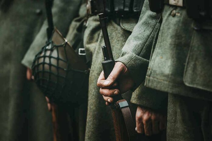 shutterstock_1340357660 Soldiers in wool uniforms holding rifles