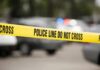 Family’s Fight to Save Son Ends Tragically Yellow police line tape at a blurred street scene
