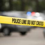 Family’s Fight to Save Son Ends Tragically Yellow police line tape at a blurred street scene