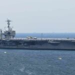 Iran’s Oil Lifeline Is Starting to Choke Aircraft carrier sailing at sea