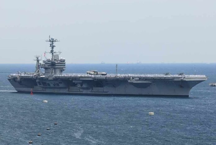 Aircraft carrier sailing at sea