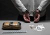 Massive Meth Setup Found – Where’d It Lead? person in handcuffs behind back over table with seized packages
