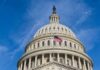 United States Capitol dome with American flag