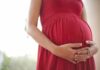 Contract vs. Life: Courtroom Firestorm Pregnant woman in a red dress holding her belly